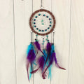 Pendentif décoratif turquoise à breloques
