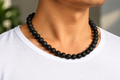 Collier oeil de tigre ou pierre de lave homme