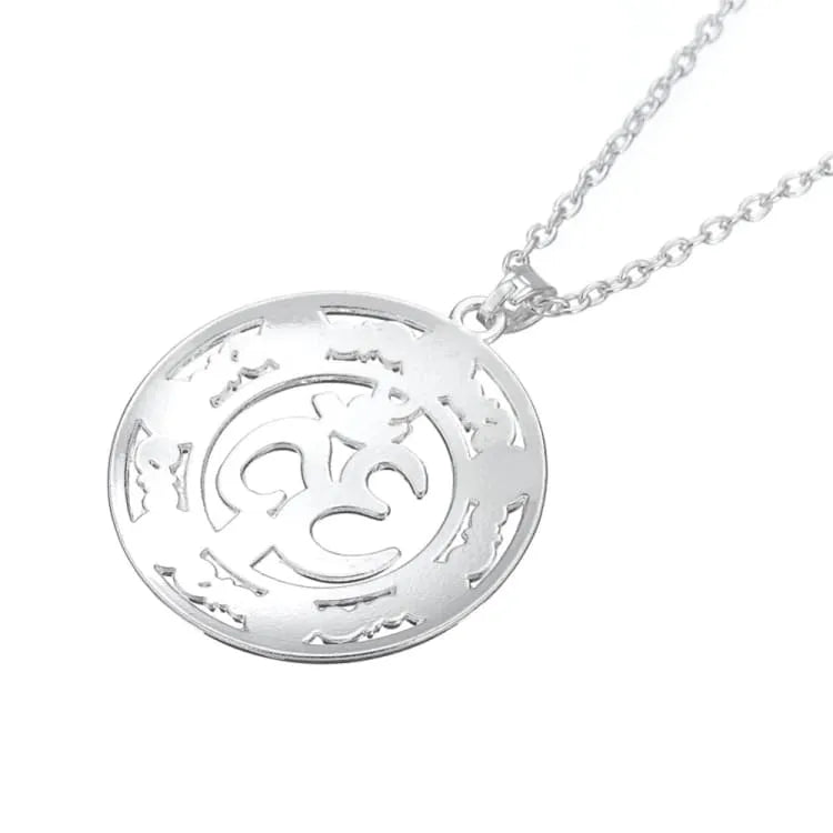 Collier 7 chakras symbole Om et cristal