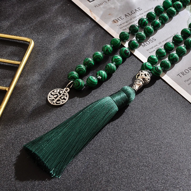 Mala tibétain en malachite à pompon