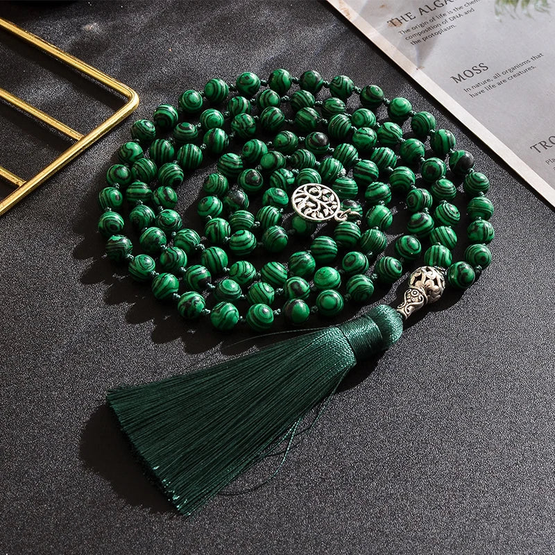 Mala tibétain en malachite à pompon