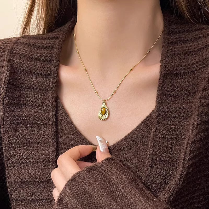 Collier oeil de tigre et ambre