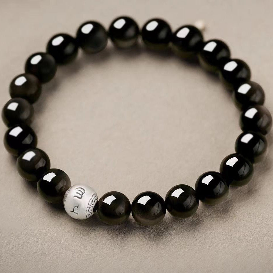 Bracelet bouddhiste en obsidienne et mantra tibétain