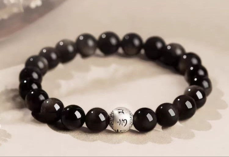 Bracelet bouddhiste en obsidienne et mantra tibétain