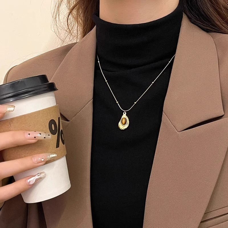Collier oeil de tigre et ambre