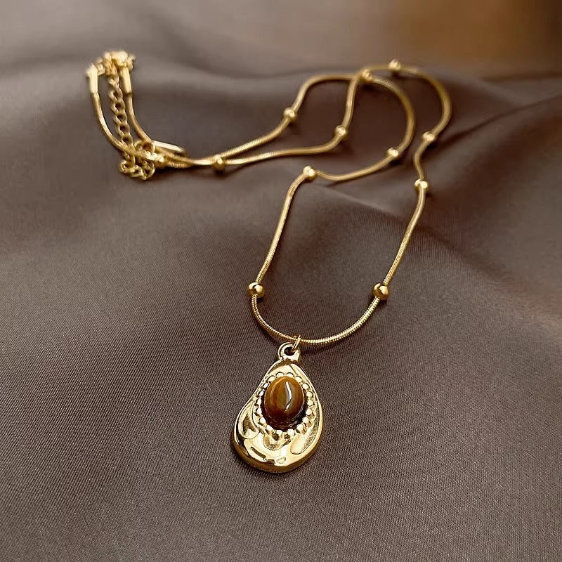 Collier oeil de tigre et ambre