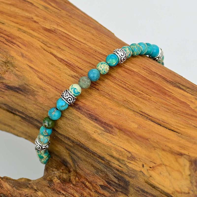 Bracelet turquoise à séparateurs ethniques