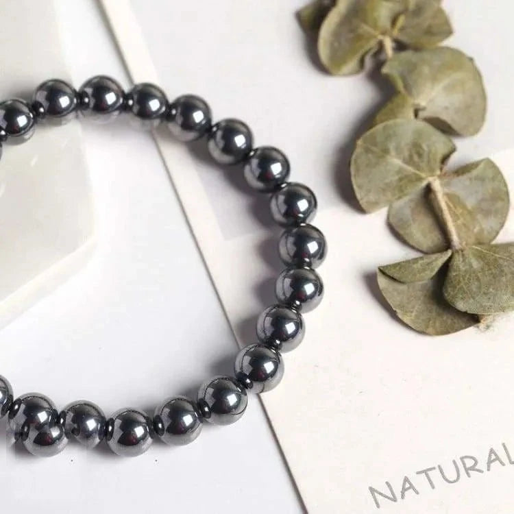 Bracelet hématite à breloque ancre