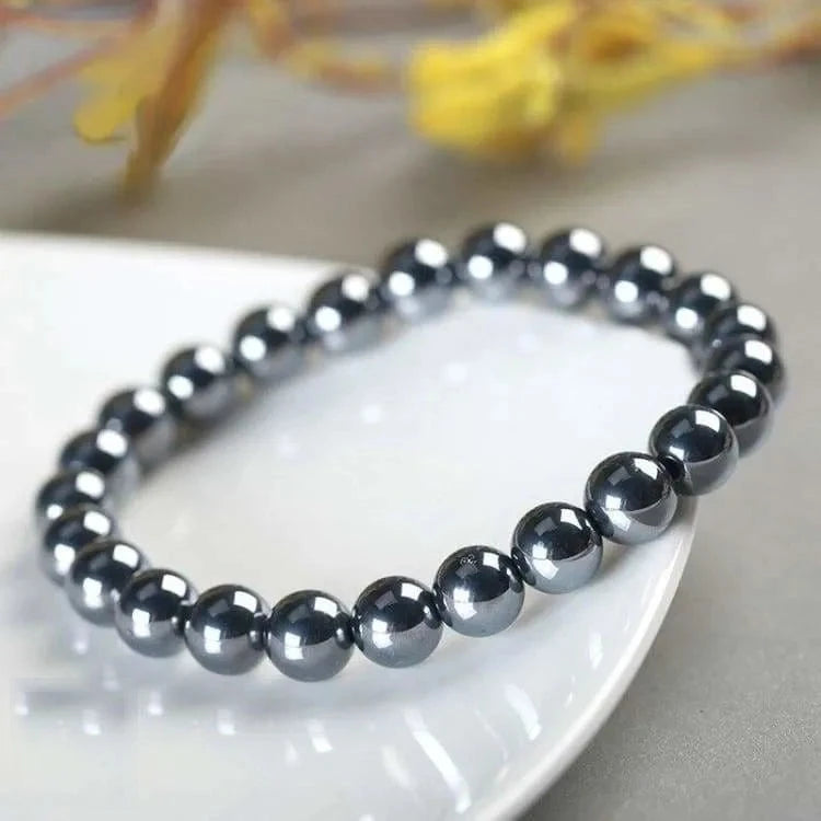 Bracelet hématite à breloque ancre