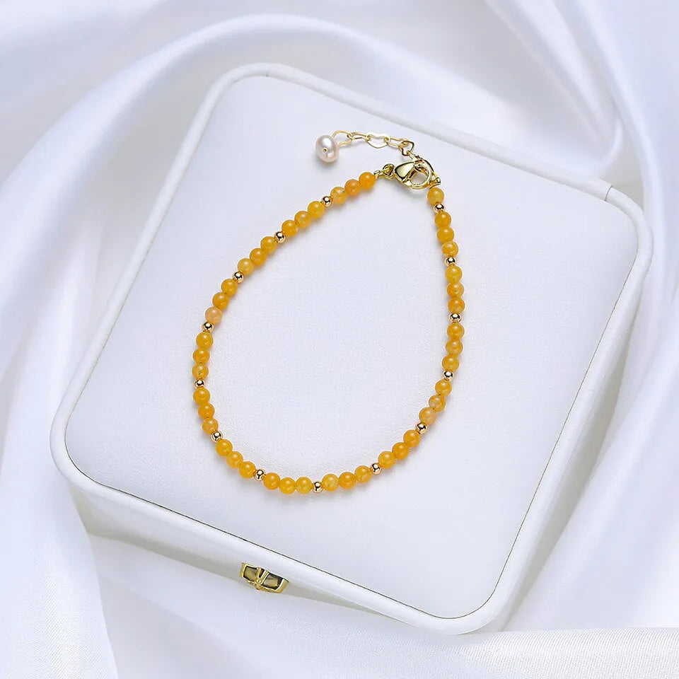 Bracelet jade jaune et dorure 18 carats