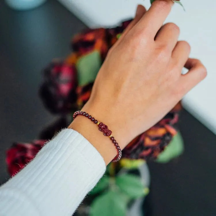 Bracelet porte bonheur grenat et Pi Xiu