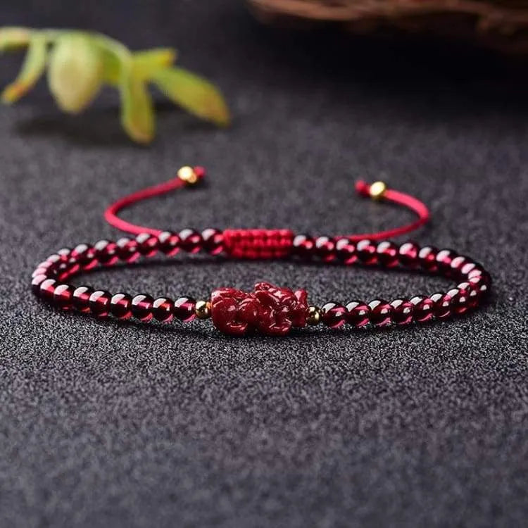 Bracelet porte bonheur grenat et Pi Xiu