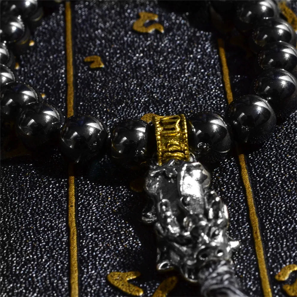 Bracelet tibétain hématite, trident et miroir