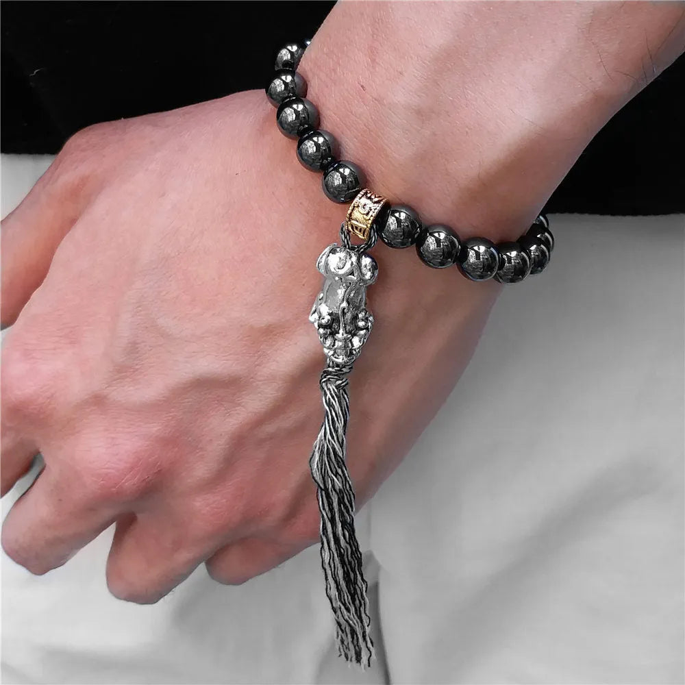 Bracelet tibétain hématite, trident et miroir