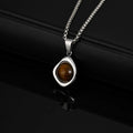 Collier oeil de tigre et agate pendentif irrégulier